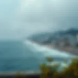 A scenic view of Busan's coastline under varying weather conditions